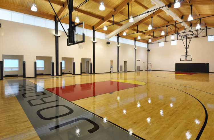 Amazing-Space-of-Sport-Designed-using-Glorious-Indoor-Basketball-Court-on-Sleek-Wooden-Floor.jpg